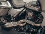 Harley Davidson motorcycle engine with custom exhaust, showcasing high-performance motorcycle upgrades.