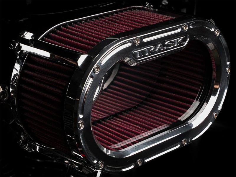 High-performance motorcycle air filter with chrome finish for enhanced engine airflow and protection.