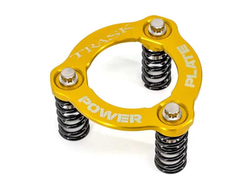 High-performance motorcycle spring compressor, gold colour, designed for Revelry Motorcycles.