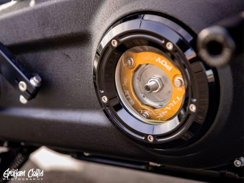 High-performance motorcycle engine component with Revelry Motorcycles branding.