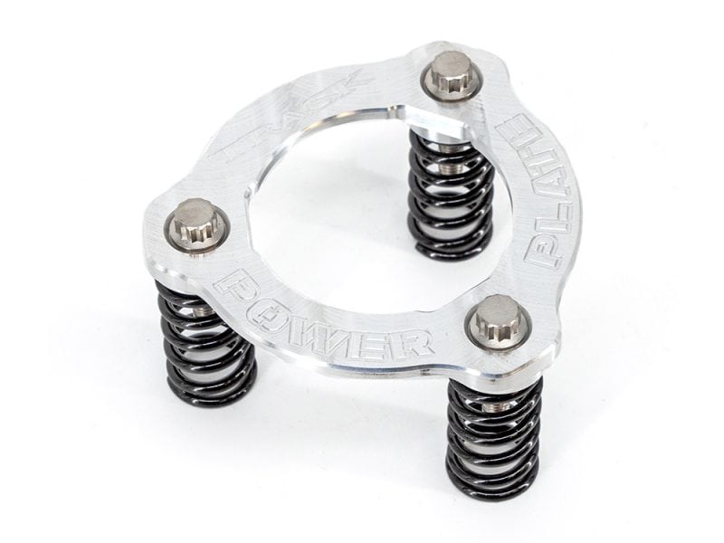 Aluminium motorcycle spring preload adjuster with four black springs for bike suspension enhancement.