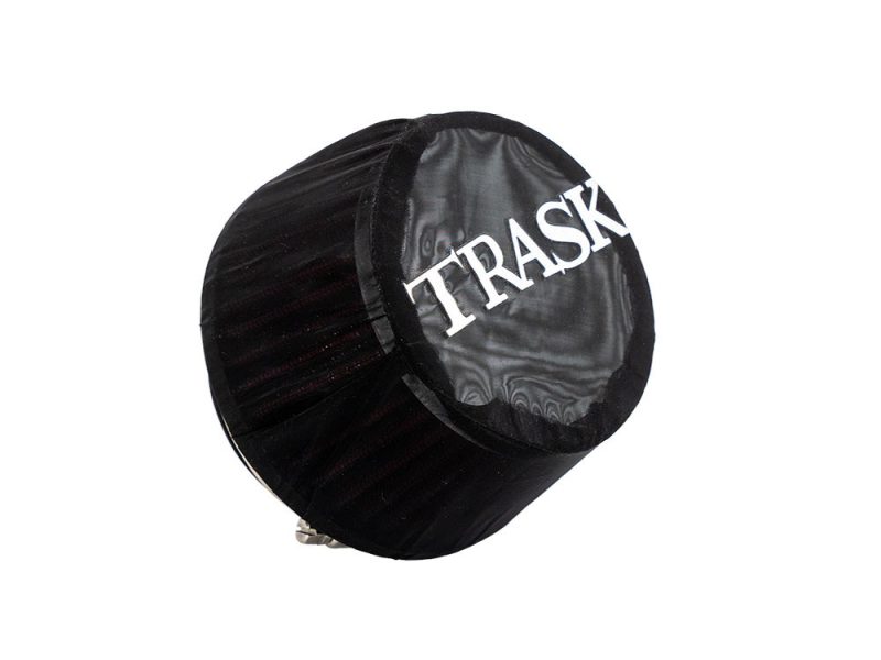 Black motorcycle radiator fan guard cover with "TRASK" branding for custom Harley Davidson bikes.