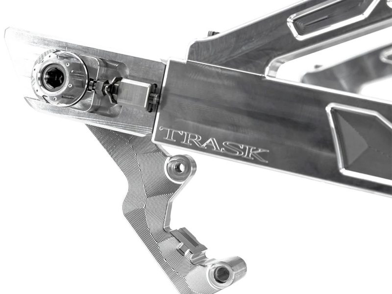 High-performance motorcycle frame with "TRASIK" branding, made from lightweight aluminium.