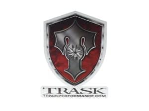 Shields emblem logo featuring TRASK Performance for motorcycle protection accessories.