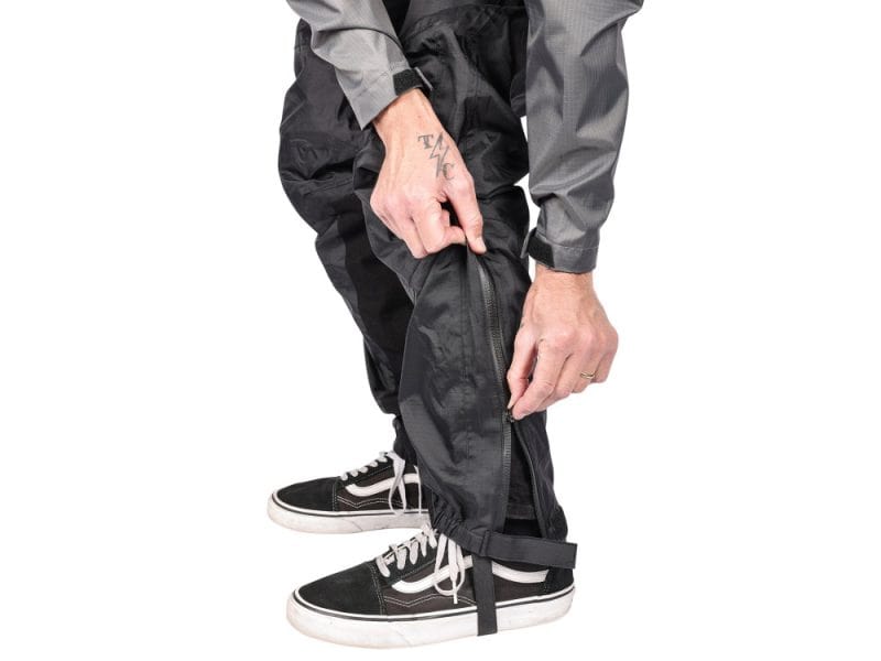 Casual motorcycle riding gear pants with zipper and strap details for Revelry Motorcycles enthusiasts.