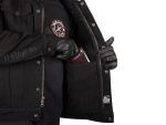 Dark motorcycle jacket with Thrasher patch and secure pocket, ideal for riding enthusiasts.