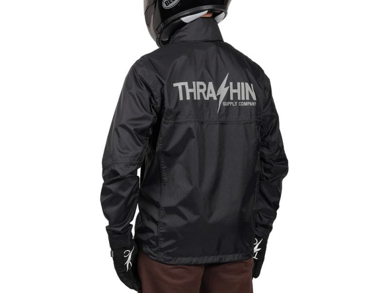 Ventilated black motorcycle jacket with ThraThIn logo for motorcycle riding gear.