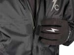 Motorcycle rider wearing Revelry branded gloves and jacket, motorcycle apparel, riding gear, adventure riding equipment.