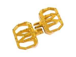 Lightweight gold motorcycle foot pegs with mounting hardware for enhanced riding style.