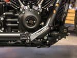 High-performance Harley-Davidson motorcycle engine close-up, showcasing custom black and chrome details.