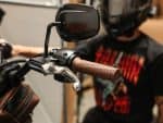 Revelry Motorcycles handlebar with brown grip and mirror, customised for rider comfort and style in Australia.