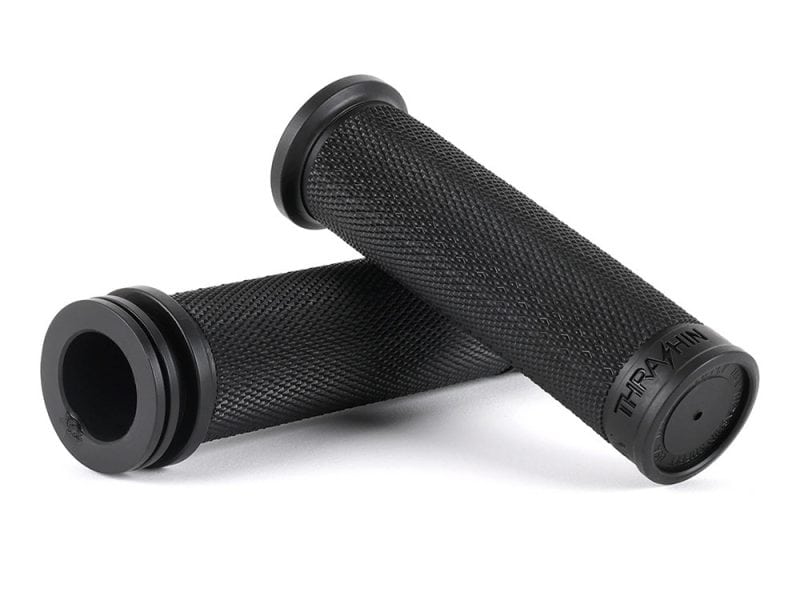 Moto Grips - Black. Rubber handlebar grips for motorcycles, black textured finish, durable and comfortable.