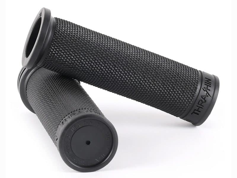 Black motorcycle handlebar grips for Triumph models, durable rubber material, optimal grip.