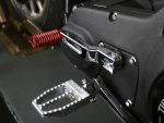 Stylish motorcycle footpegs on a black Revelry Motorcycle bike, showcasing quality and craftsmanship.