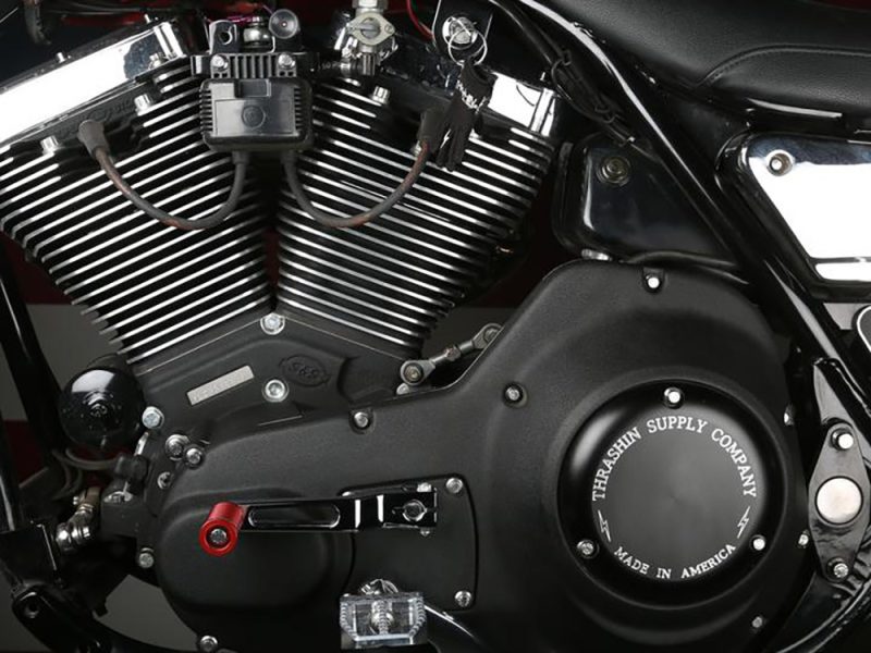 Engine close-up shot of a custom motorcycle from Revelry Motorcycles, showcasing high-quality black and silver components.
