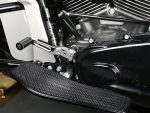 Revelry Motorcycles black footpeg and engine detail, Australian custom motorcycle parts and accessories.
