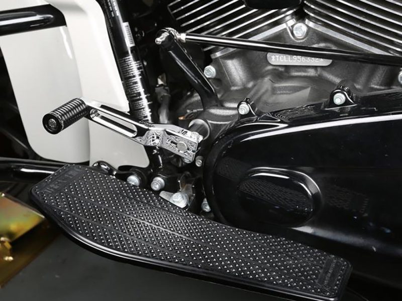 Revelry Motorcycles black footpeg and engine detail, Australian custom motorcycle parts and accessories.