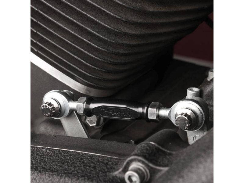 HRC motorcycle engine linkage part, close-up image of high-quality motorcycle component.