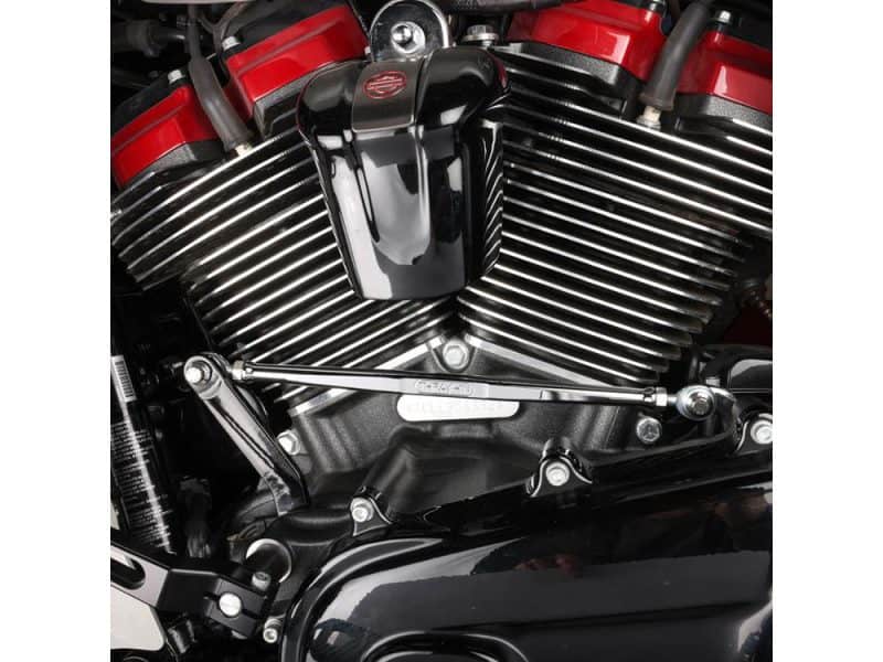 High-performance motorcycle engine components at Revelry Motorcycles, showcasing precision-engineered parts and rider gear.