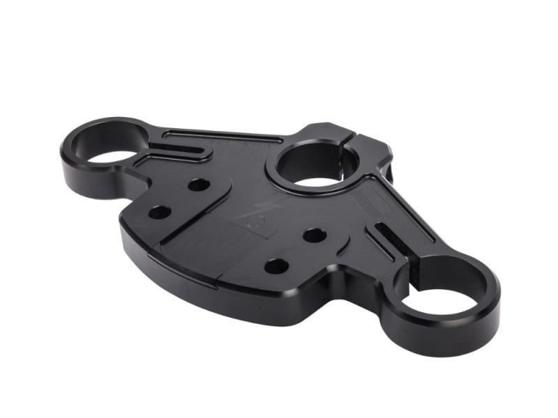 Aluminium motorcycle triple tree clamp for enhanced steering stability.