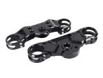 Lightweight black motorcycle handlebar risers for enhanced riding comfort and control.