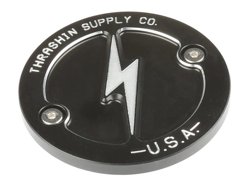 Black motorcycle fuel cap with lightning bolt logo and "Transpaishin Supply Co. U.S.A." text.
