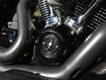 Powerful motorcycle engine components with high-quality chrome and black finishes.