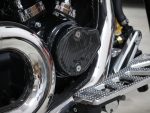 High-performance motorcycle engine detail with chrome and carbon fibre components.
