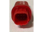 Red motorcycle connector plug for Revelry Motorcycles accessories and parts.