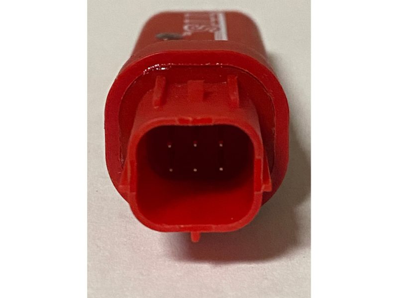 Red motorcycle connector plug for Revelry Motorcycles accessories and parts.