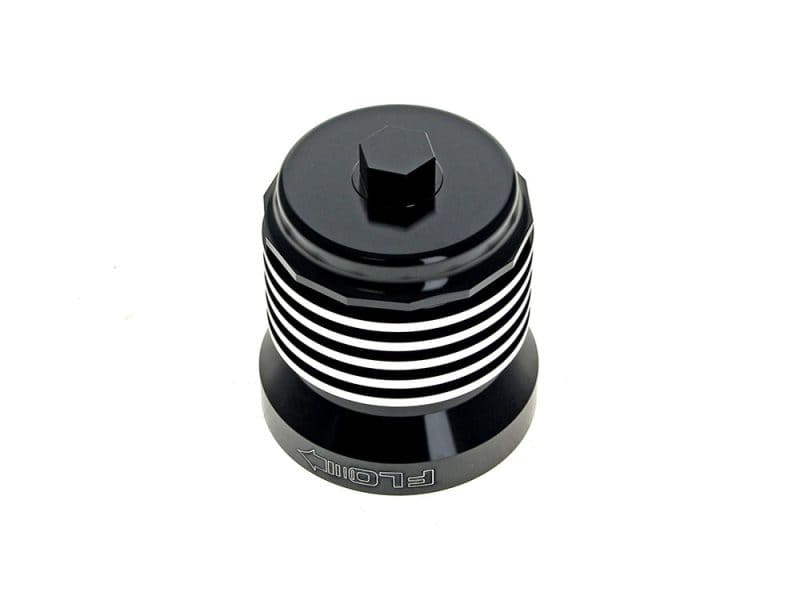 Black motorcycle oil filler cap with white stripes for Revelry Motorcycles.