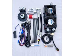 High-performance motorcycle cooling system with radiator, hoses, and electronic components for Revelry Motorcycles.