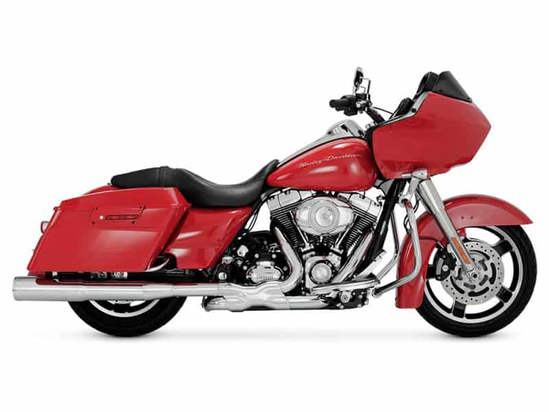 Harley-Davidson touring motorcycle in red with saddlebags and large front fairing.