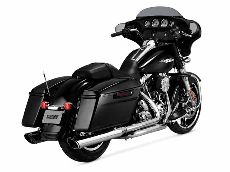 Harley-Davidson touring motorcycle with black hard saddlebags and chrome accents.