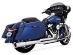 Vance & Hines Harley Davidson touring motorcycle with custom blue paint and saddlebags.