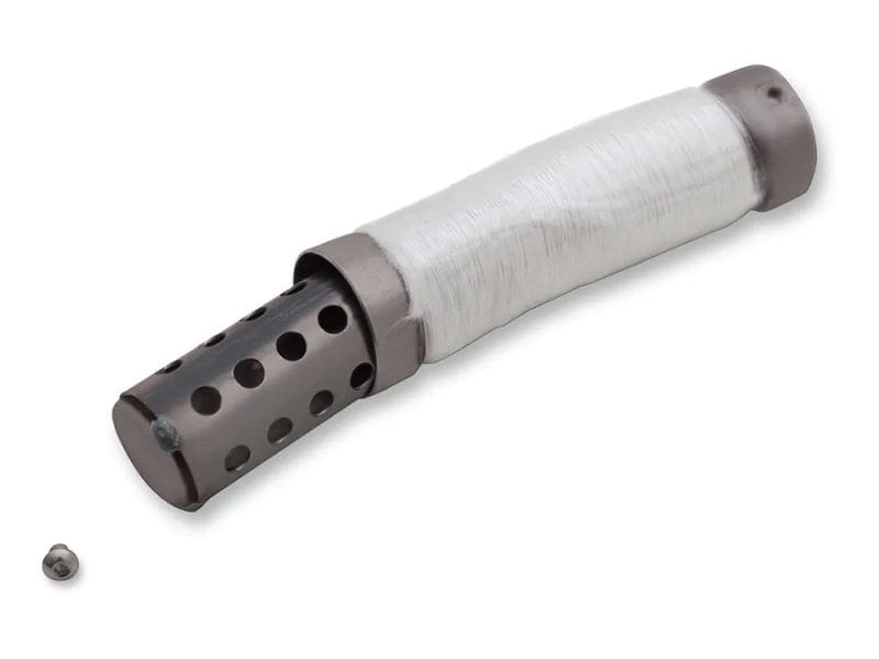 Rubber motorcycle exhaust silencer with perforated metal end cap for Harley Davidson bikes.