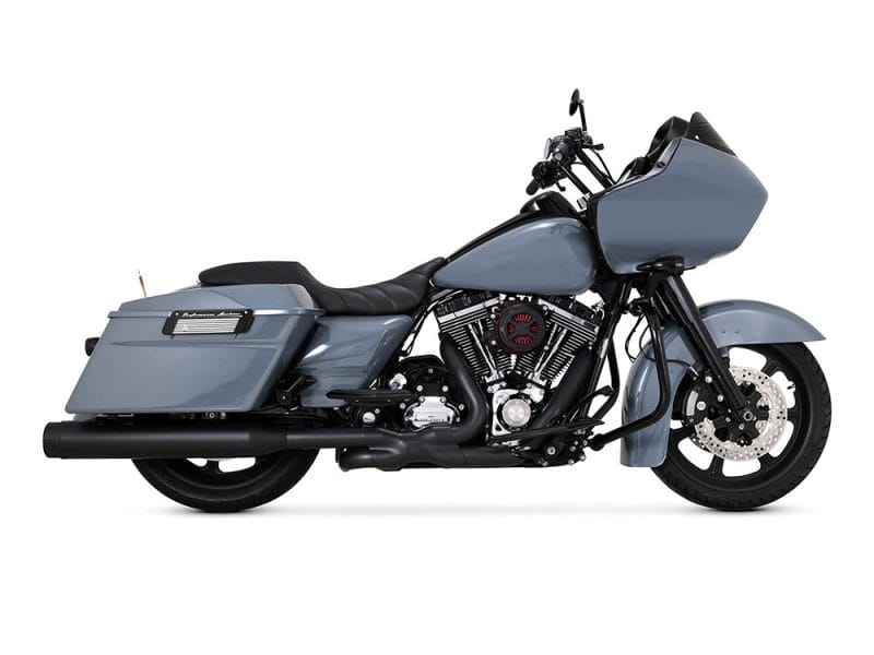 Custom grey touring motorcycle with hard saddlebags and advanced rider features.