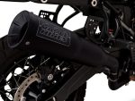 Vance & Hines motorcycle exhaust system on a black off-road bike for adventure riding.