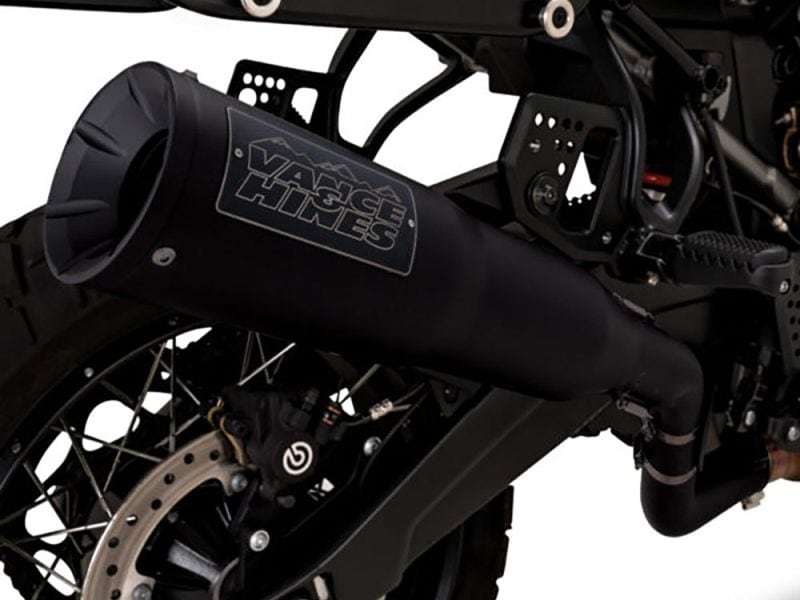 Vance & Hines motorcycle exhaust system on a black off-road bike for adventure riding.