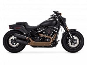 Harley Davidson black motorcycle with dual exhaust pipes and rugged design.