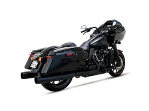 Harley-Davidson touring motorcycle with black finish and custom exhaust pipes.