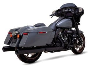 Harley Davidson touring motorcycle with saddlebags and a sleek black and grey finish.