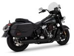 Harley Davidson touring motorcycle with black leather saddlebags and windshield.