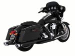 Harley Davidson touring motorcycle with black saddlebags and fairing, perfect for long road trips.