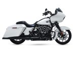 Harley Davidson touring motorcycle with white fairings and saddlebags, ideal for long-distance riding.