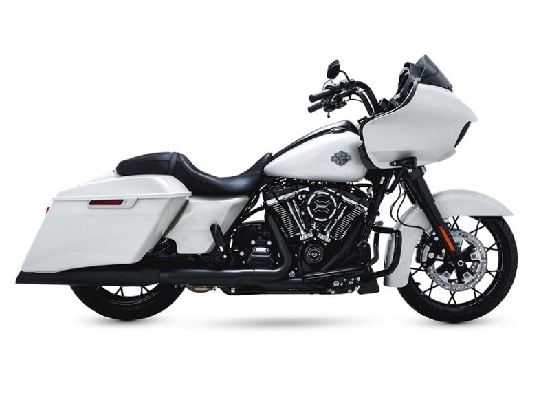 Harley Davidson touring motorcycle with white fairings and saddlebags, ideal for long-distance riding.