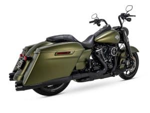 Vast green Harley-Davidson touring motorcycle with saddlebags and cruiser style, perfect for long-distance rides.