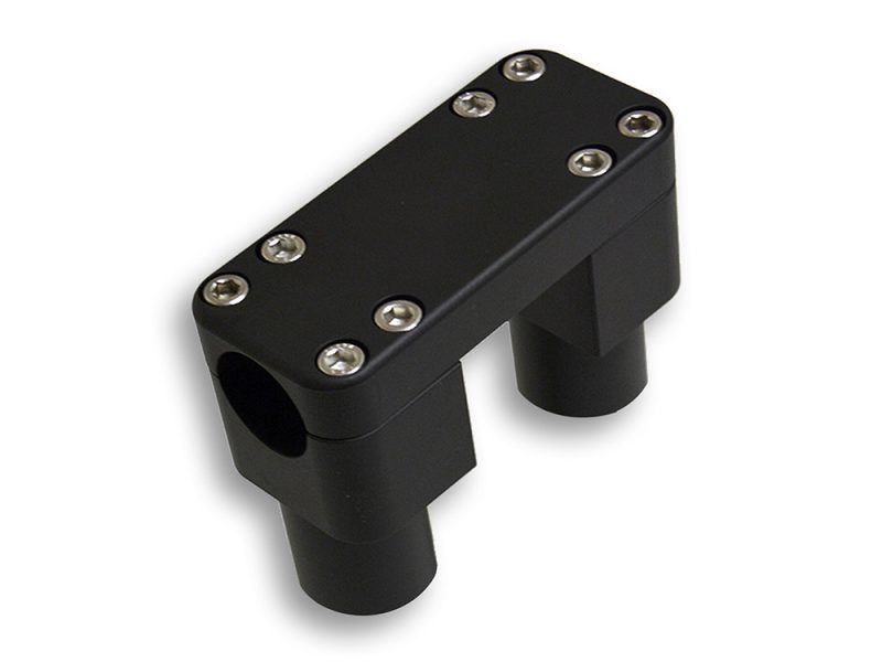 Black motorcycle handlebar riser mount for Revelry Motorcycles accessories and custom builds.